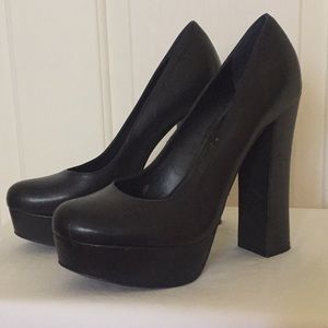 Black pumps with thick sturdy 5 1/2 heel.
